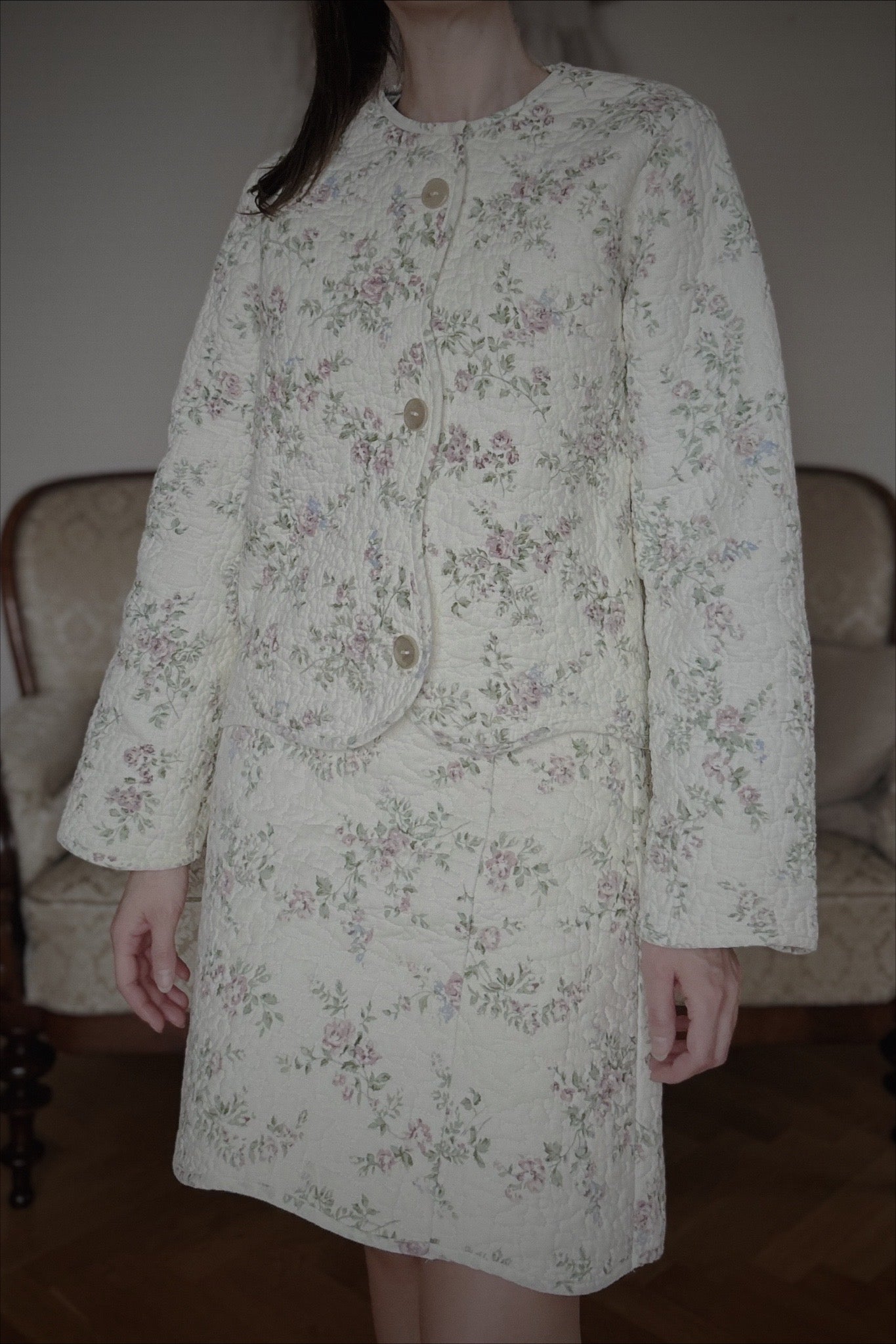 Dräkt i kviltat täcke